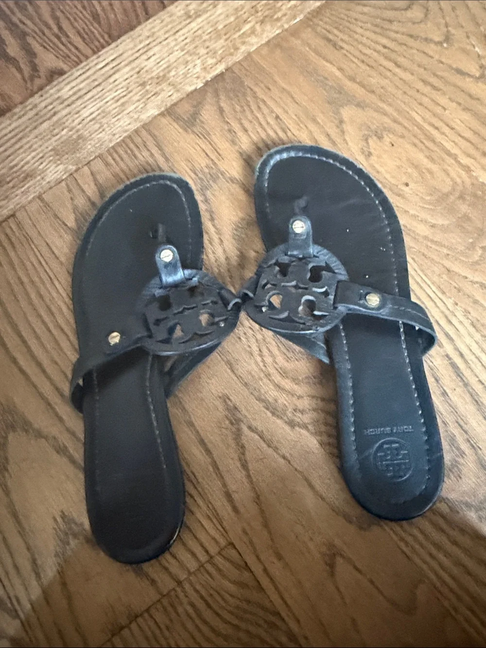 Tory Burch Black Leather Logo Thong Sandals with Gold Accents